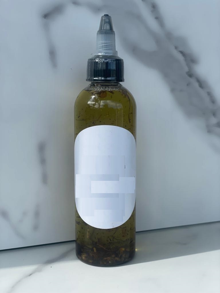 Bottle of Divine Garden 111 oil pulling blend for oral care rituals